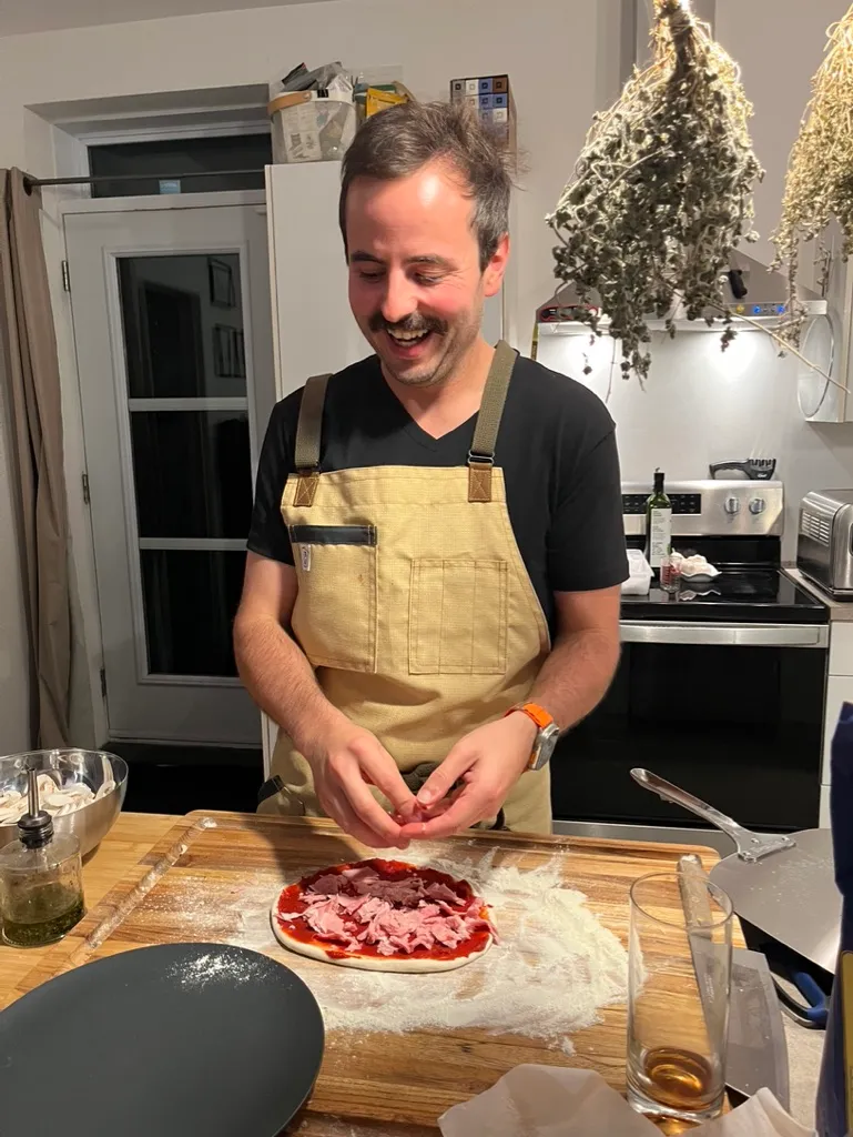 Jp baking a pizza