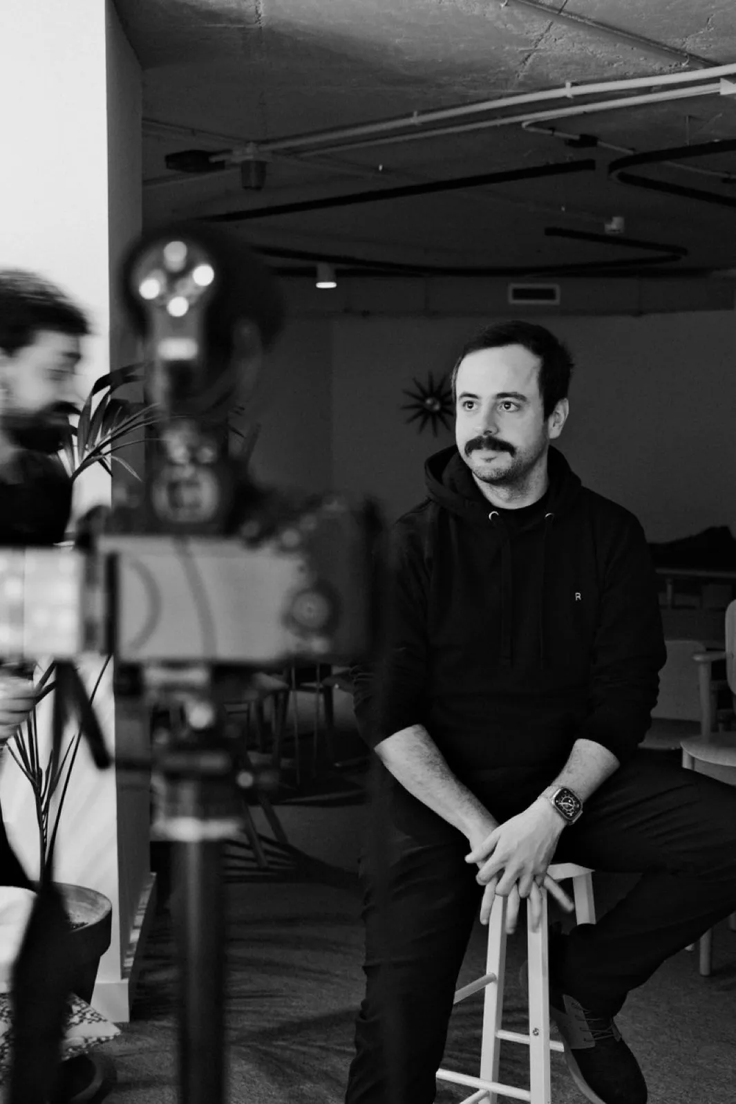 Jp holding a film camera