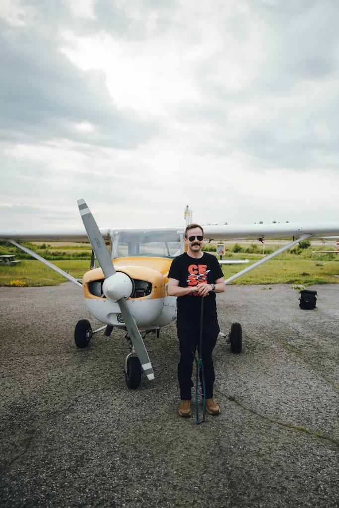 Jp in a small plane, headset on